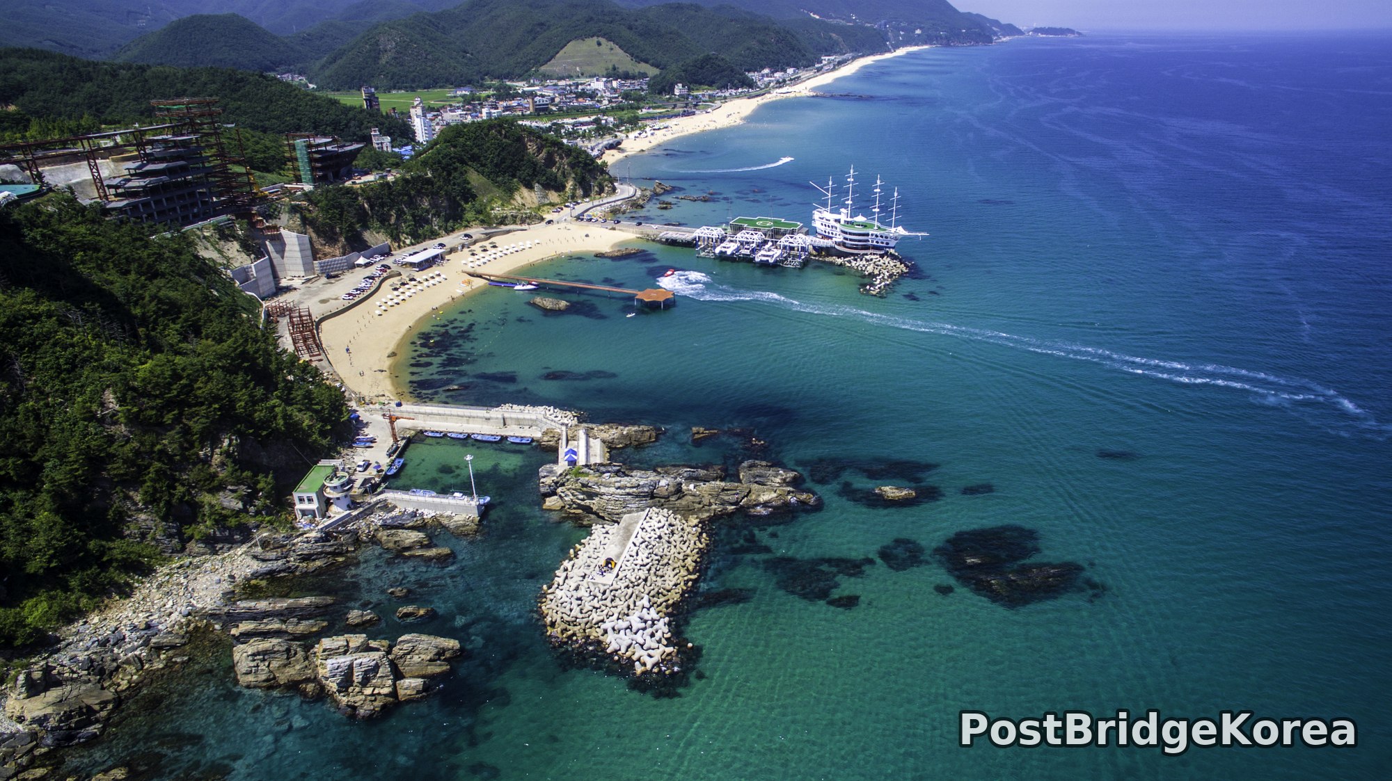 Jeongdongjin Aerial Drone Photography: Coastal Cliff Geometry, Ship-Hotel Composition and Exposure Settings Guide